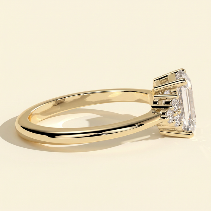 The Serene - Emerald Cut Lab Grown Diamond Low Set Solitaire with Round Shoulder Stones Engagement Ring