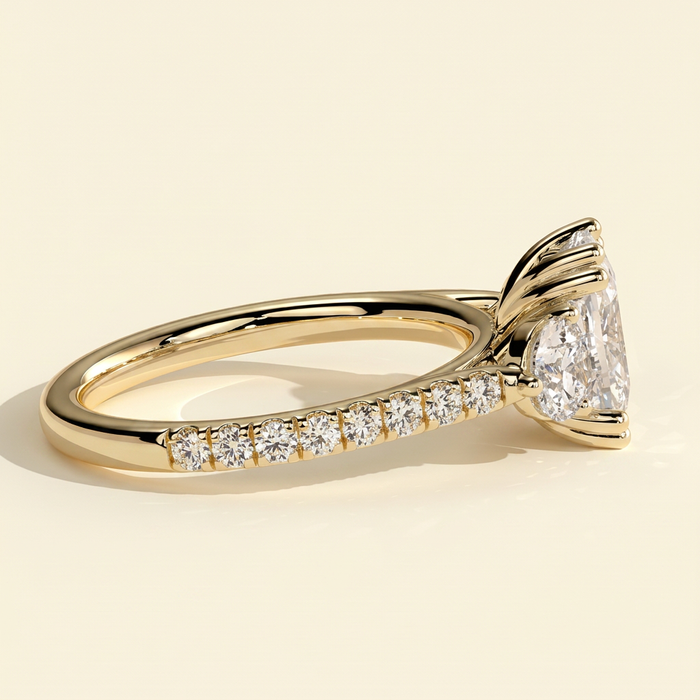 The Ivara - Elongated Cushion Cut Lab Grown Diamond Double Claw Three Stone with Pave Band and Cathedral Setting Engagement Ring