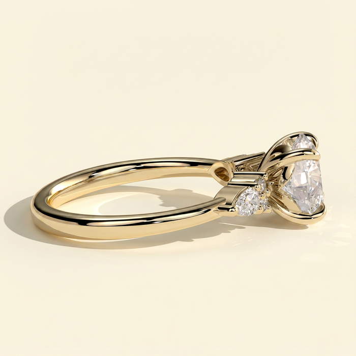 The Clea - Round Cut Lab Grown Diamond Three Stone with Pear Shoulder Stones and Tulip Gallery Engagement Ring