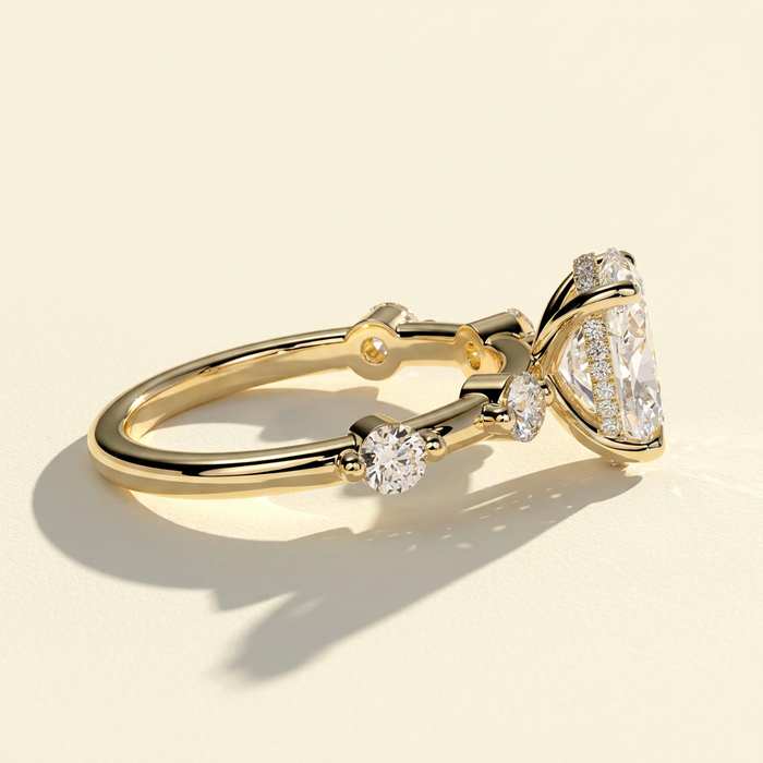 The Nuria - Oval Lab Grown Diamond Ring with Round Accents & Hidden Halo