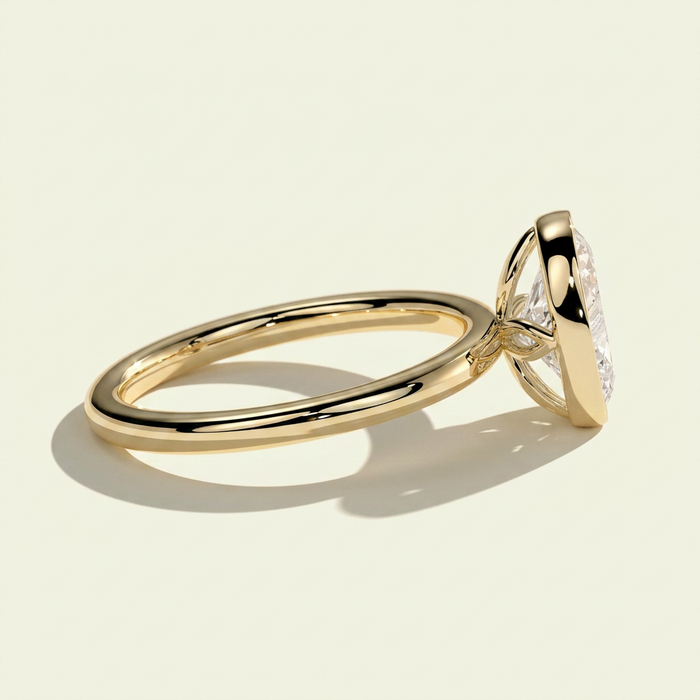 The Kelia - Oval Lab Grown Diamond Bezel Solitaire with Petal Gallery Setting