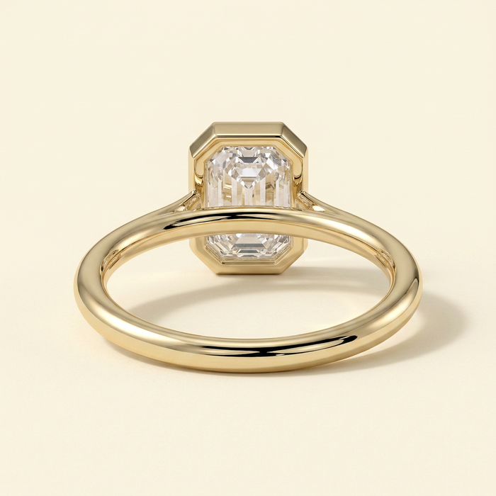 The Helia - Emerald Cut Lab Grown Diamond Bezel Set Solitaire with Open Cathedral Engagement Ring