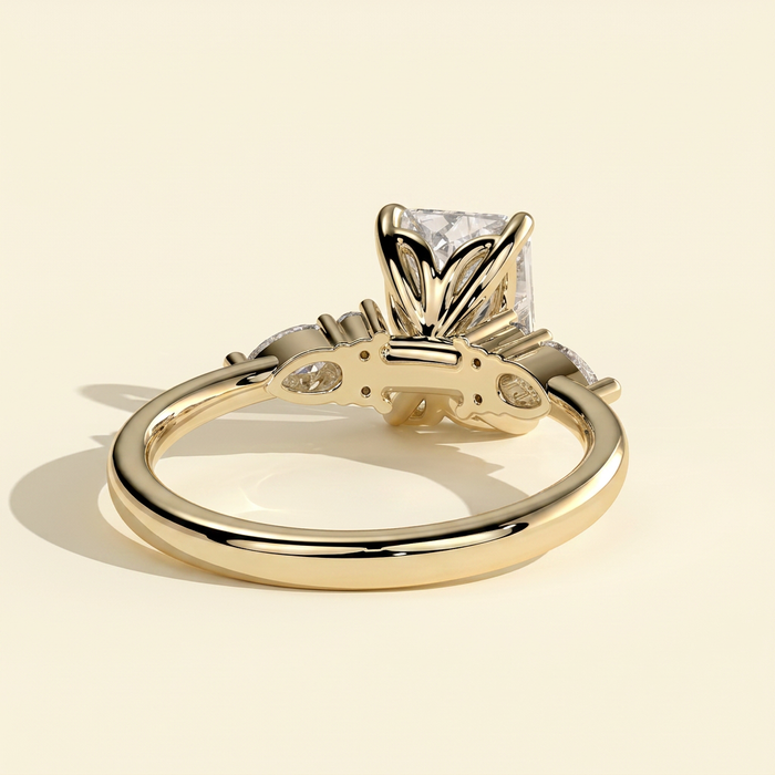 The Raina - Radiant Cut Lab Grown Diamond Three Stone Tulip Gallery Ring with Pear Side Stones