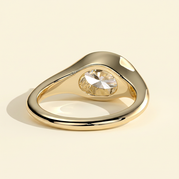 The Colette - Oval Cut Lab Grown Diamond East West Bezel Set Solitaire with Signet Band Engagement Ring