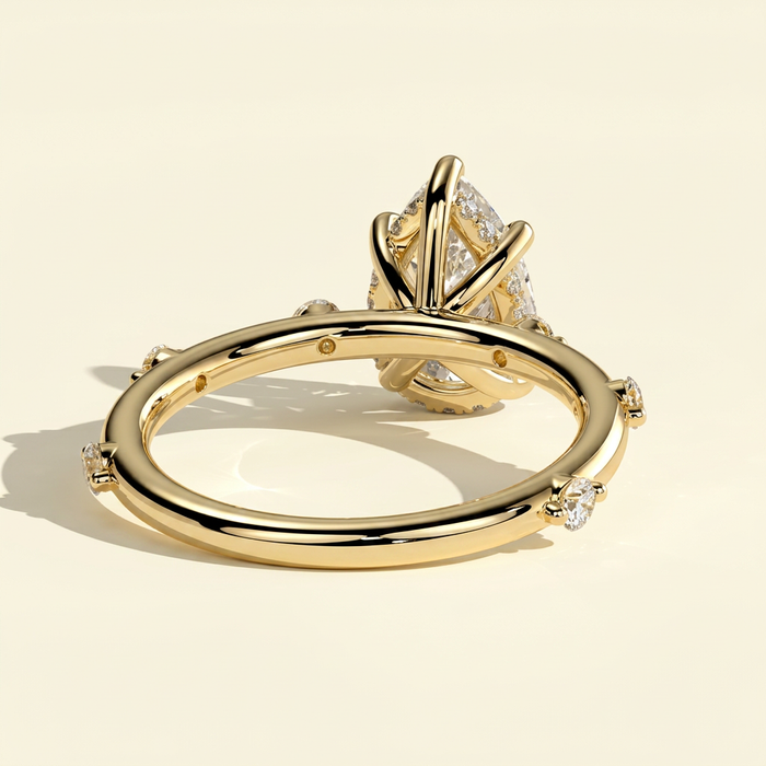 The Nixie - Pear Cut Lab Grown Diamond Ring with Hidden Halo and Accents