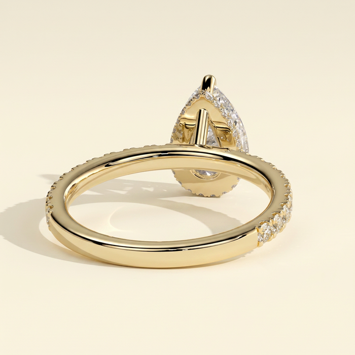 The Hestia - Pear Cut Lab Grown Diamond Wrap Around Hidden Halo Solitaire with Pave Band Engagement Ring
