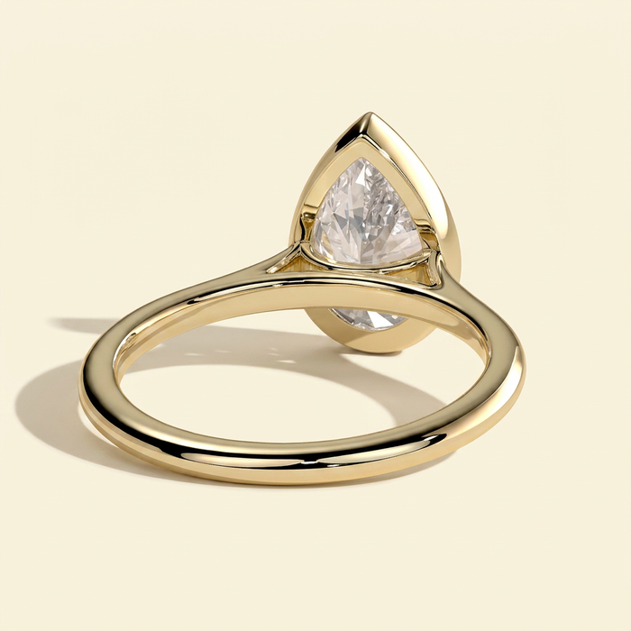 The Delphi - Pear Cut Lab Grown Diamond Bezel Set Cathedral Solitaire Engagement Ring