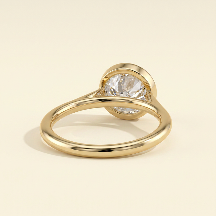 The Ceres - Round Cut Lab Grown Diamond Bezel Solitaire with Open Cathedral Setting Engagement Ring
