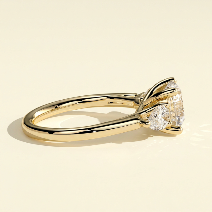 The Amara - Round Lab Grown Diamond Three Stone Ring with Pear Side Stones