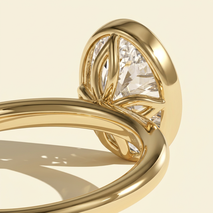 The Kelia - Oval Lab Grown Diamond Bezel Solitaire with Petal Gallery Setting